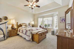 Primary bedroom with raised ceiling