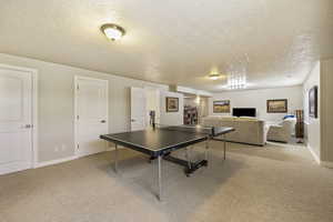 Living room with ping-pong table.