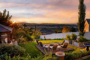 View of yard with a garden and a mountain view