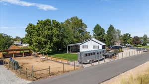 View of front facade with an exterior structure and an outbuilding