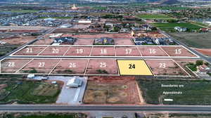 Aerial view of property and surrounding area featuring property parcel outlined