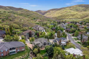 Aerial view of residential area with a mountainous background