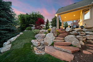 View of yard at dusk