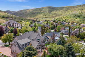 Aerial view of residential area with a mountainous background