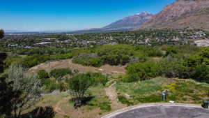 Aerial view of property's location featuring mountains