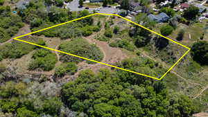 Aerial overview of property's location featuring property boundaries highlighted