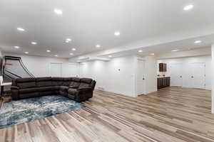 The basement was completed in 2023 with 9-foot ceilings, high-end LVP flooring and a separate entrance