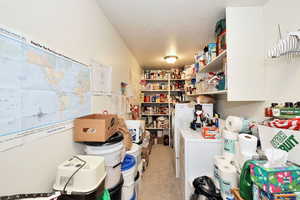 Laundry area featuring washer and clothes dryer
