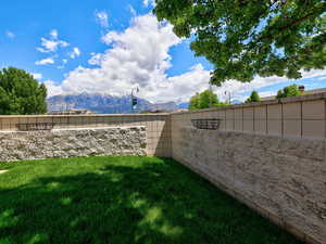 View of yard with a mountain view