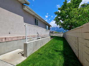 View of yard with a mountain view