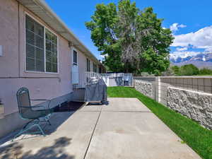 View of patio / terrace with a mountain view