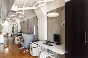 Office area featuring wood finished floors