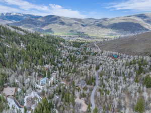Aerial overview of property's location with a mountain backdrop