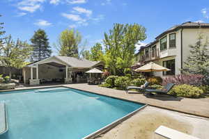 Swimming pool with a patio