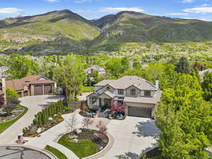 View from above of property with a mountain backdrop