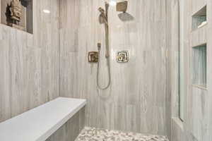 Bathroom with tiled shower
