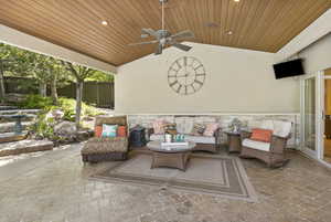 View of patio / terrace with an outdoor hangout area, ceiling fan, and fence