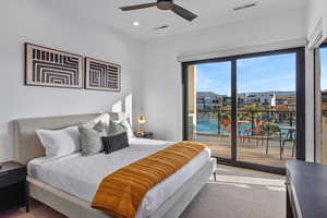 Carpeted bedroom with access to exterior, a ceiling fan, and recessed lighting