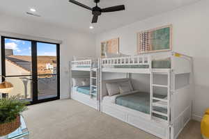 Carpeted bedroom featuring access to outside and recessed lighting