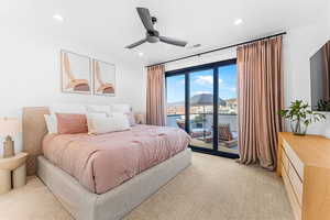 Bedroom featuring access to outside, recessed lighting, light carpet, and ceiling fan