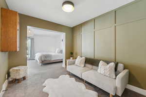 Bedroom with carpet and baseboards