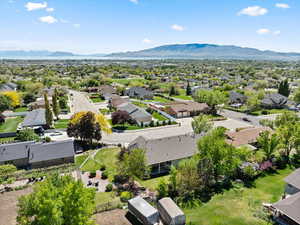Aerial view of residential area featuring a mountainous background