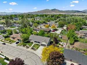 Aerial perspective of suburban area featuring mountains
