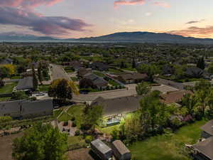 View of property location featuring a mountain backdrop and nearby suburban area