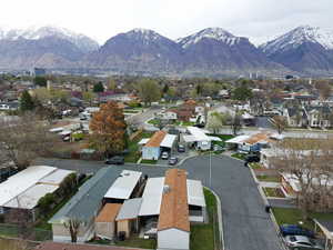 Birds eye view of property featuring a residential view and a mountain view