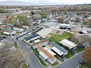 Aerial view featuring a residential view and a mountain view