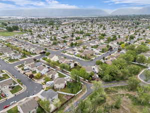 Birds eye view of property featuring a residential view and a mountain view