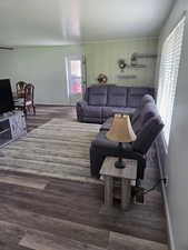 Living area featuring wood finished floors
