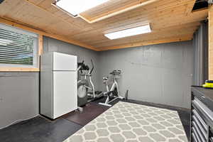 ADU Workout area with wood ceiling