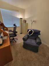 Office area featuring carpet flooring and baseboards
