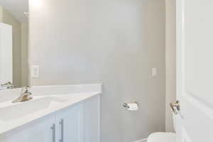 Bathroom with vanity and toilet