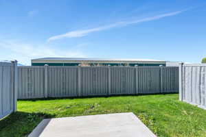 View of yard with a patio