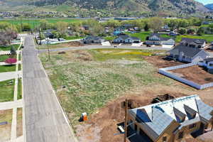 Aerial perspective of suburban area featuring mountains