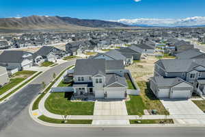 Aerial view of residential area with a mountain backdrop
