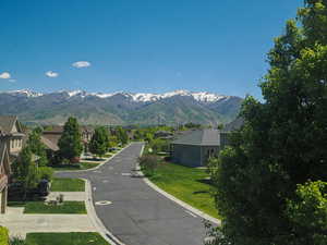 View of mountain background featuring nearby suburban area