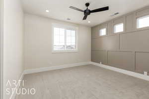 Unfurnished room with a ceiling fan, healthy amount of natural light, baseboards, carpet, and recessed lighting