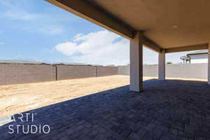 Fenced backyard featuring a patio area