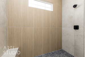 Full bath featuring tiled shower