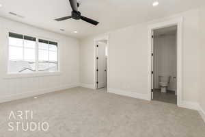 Unfurnished bedroom featuring carpet, baseboards, recessed lighting, connected bathroom, and a ceiling fan