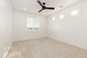 Unfurnished room featuring healthy amount of natural light, baseboards, carpet, ceiling fan, and recessed lighting