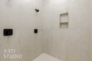 Bathroom with tiled shower