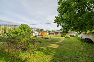 View of yard with a mountain view