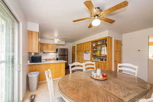 Dining area featuring a ceiling fan