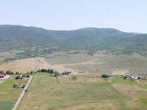 View of property location with rural landscape and mountains