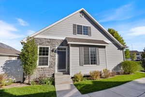 View of front of home featuring stone siding