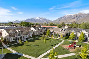 Aerial view of residential area featuring mountains